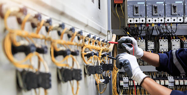 Professional Electrician technician working in Holtsville, NY